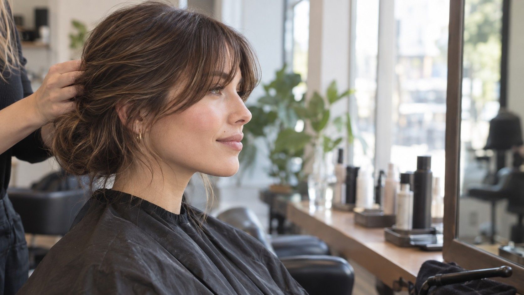 Soft brow-length bangs with longer curtain pieces at the sides